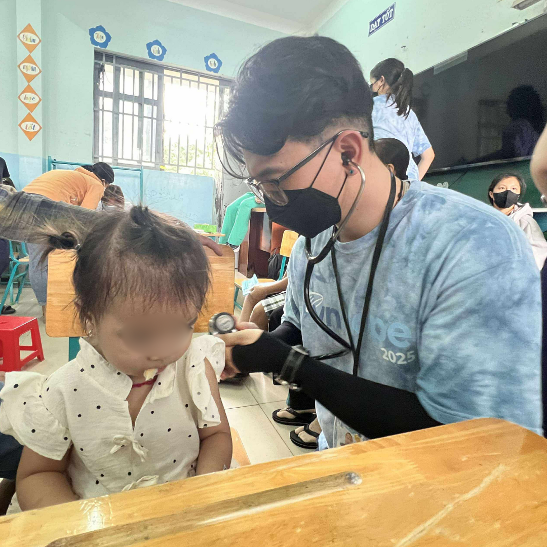 Conway Hsieh (right) volunteered with VnHOPE, a medical mission serving rural communities in Vietnam. Photo courtesy of VnHOPE.