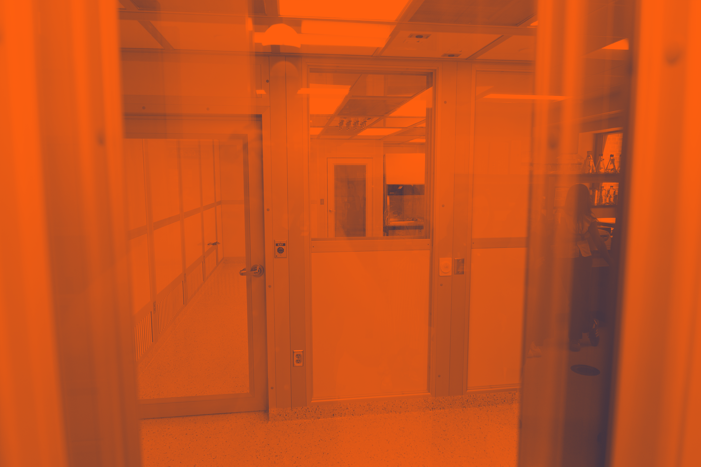 photo of the entrance to the Translational Oncology and Regenerative Medicine Laboratory with an orange gradient applied