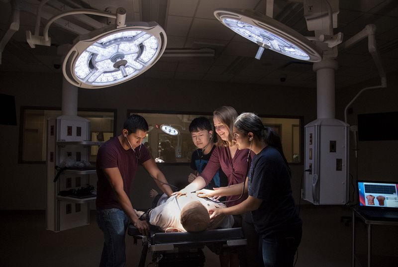 Practicing clinical skills with my classmates in the JUMP Simulation Center. Photo credit: Heather Coit