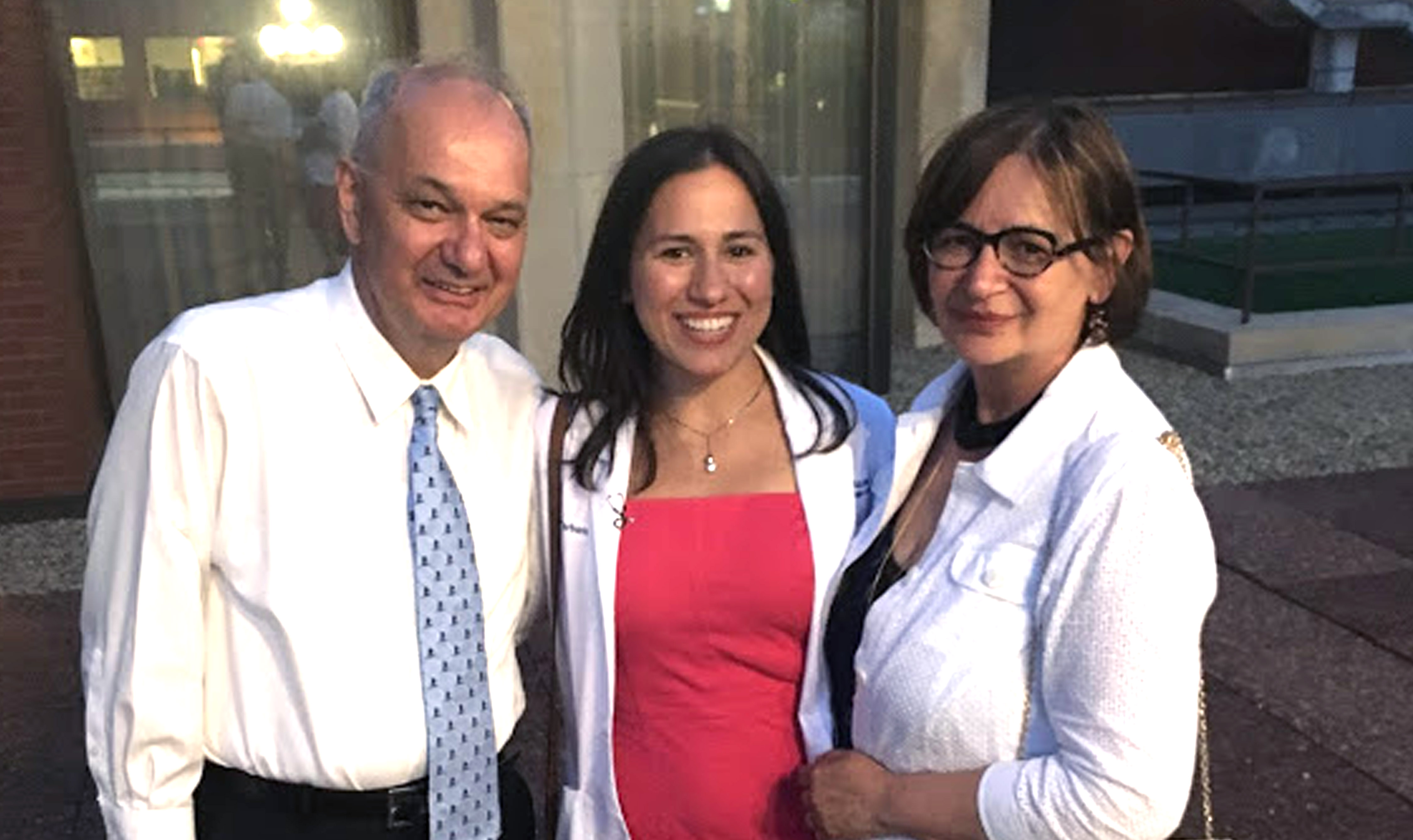 Lidija and parents at white coat ceremony