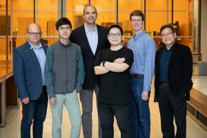 Carle Illinois Health Innovation Professor and professor of bioengineering, Wawrzyniec Dobrucki, ; Zhongmin Zhu, graduate student: Viktor Gruev, professor of electrical and computer engineering; Zuodong Liang, graduate student; Steven Blair, graduate student; Shuming Nie, professor of bioengineering