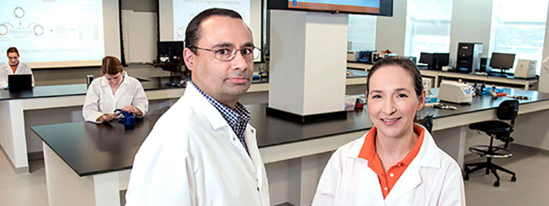 Pablo Perez-Pinera, left, and Karin Jensen developed remote laboratory exercises to help students learn common lab techniques.