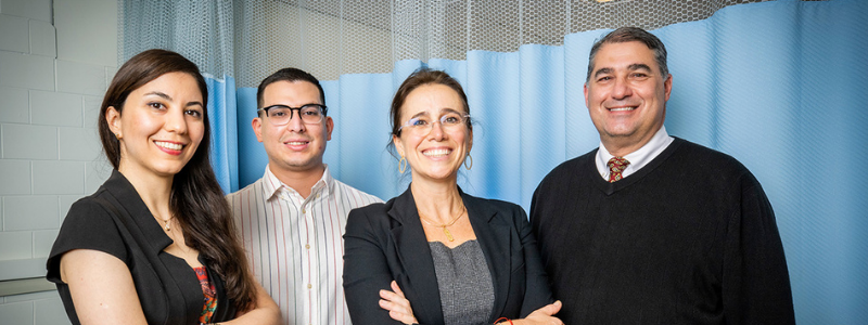 Research by scientists at the University of Illinois Urbana-Champaign identifies the stomach, not the liver, as the site of alcohol first-pass metabolism in women who underwent sleeve gastrectomy surgery. The team, from left, postdoctoral fellow and first author Neda Seyedsadjadi; graduate student Raul Alfaro Leiva; M. Yanina Pepino, professor of food science and human nutrition; and Dr. Blair Rowitz, professor of nutritional sciences and the associate dean for clinical affairs at the Carle Illinois College of Medicine.

Photo by Fred Zwicky