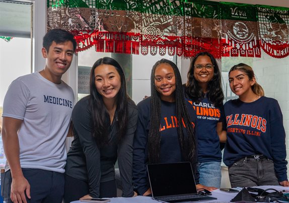 (L-R): Second-year medical students Nicholas Nguyen (Co-Director of Avicenna Lifestyle) and Claire Lee (Co-Director of Avicenna Lifestyle), senior Haihley Connors (Co-Director of Avicenna Outreach), second-year medical student Anisha Mittal (Co-Director of Avicenna Outreach) and sophomore Isela Villase&amp;amp;ntilde;or (Avicenna Interpretations volunteer) from the Lifestyle, Outreach, and Interpretations team volunteer at the Campana de Salud Health Fair, promoting Avicenna, educating about healthy nutrition, and offering blood pressure screenings.