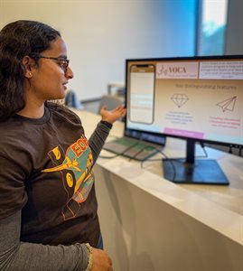 Second-year med students Shreya Rangarajan presents her VOCA Health project at the Engineering Open House Startup Showcase.