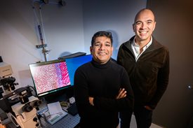 <em>Postdoctoral researcher Indrajit Srivastava, left, and electrical and computer engineering professor Viktor Gruev led a team of researchers developing new cancer imaging agents that can light up two cancer biomarkers when lit by one fluorescent wavelength. </em>