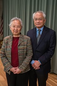 <em>May (left) and Ving Lee attended the ceremony honoring Martin Burke as the May and Ving Lee Professor for Chemical Innovation.</em>