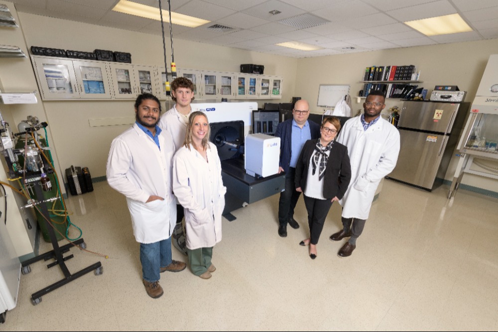 <em>From left: Researchers Michael Nelappana, Nicolas Dovalovsky, Catherine Applegate, Wawrzyniec Dobrucki, Iwona Dobrucka, and Goodluck Okoro.</em>