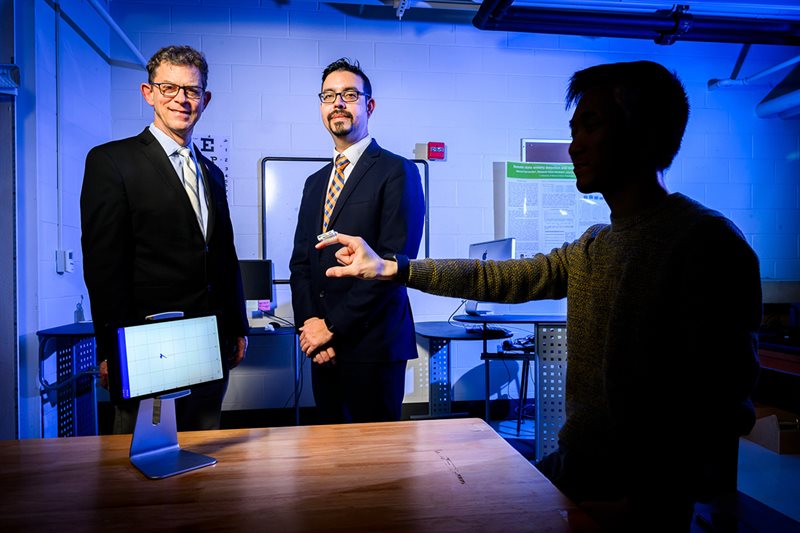Illinois professors Richard Sowers, left, and Manuel Hernandez used machine learning techniques to improve data analysis from wearable sensors to detect symptoms and monitor the progression of Parkinsonâ€™s disease.
Photo by Fred Zwicky
